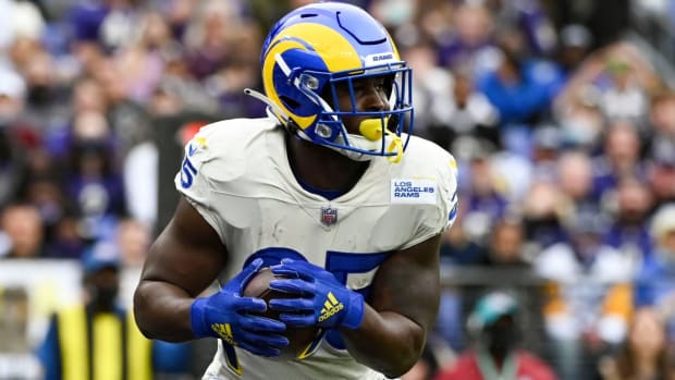 Jan 2, 2022; Baltimore, Maryland, USA; Los Angeles Rams running back Sony Michel (25) rushes during the first half against the Baltimore Ravens at M&T Bank Stadium. Mandatory Credit: Tommy Gilligan-USA TODAY Sports